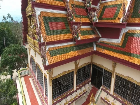 Flying Over the Roof of the Temple in Koh Samui, Thailand Stock Footage