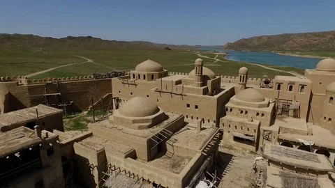Flying over the rooftops of the castle of nomads. Stock Footage 75741807