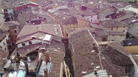 Flying over the rooftops in Garda lake area, Italy Stock Footage 114748864