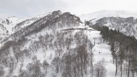 Flying over rope-way with gondolas at mountain resort Crystal Park in Bakuriani Видео 150524630