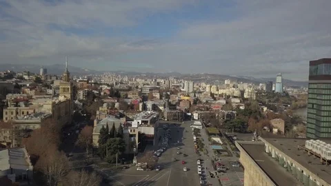 Flying over Rose Revolution Square and Shota Rustaveli Ave. Tbilisi. Georgia Stock-Footage 83391440