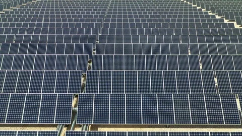 Flying over rows of solar panels Stock Footage 97512824