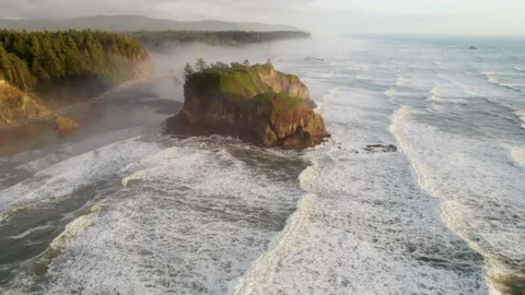 Flying over Ruby beach, Oregon, United States. Pacific waves and huge stones on Stock Footage 162815743