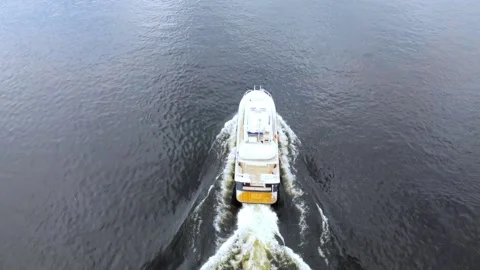 Flying over a running boat Stock Footage 154271321