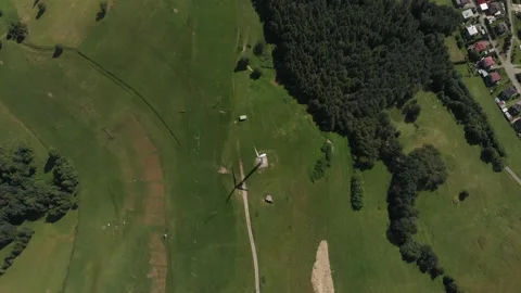 Flying over running wind turbine in Beskids mountains. Rytro, Poland. Stock Footage 140072016