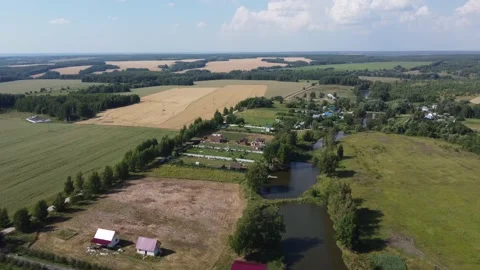 Flying over a rural pond Video stock 232708253