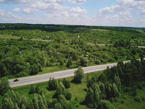 Flying over a rural road Stock Footage 81363610