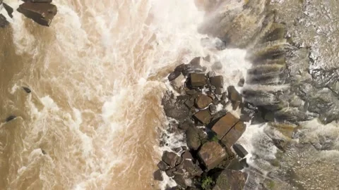 Flying over a rushing river and waterfall. Salto Saudades. 4K. Video stock 233219667