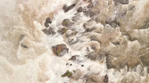 Flying over a rushing river and waterfall. Salto Saudades. 4K. Aerial. Stock Footage 233219669