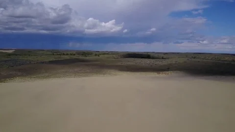 Flying over sand  Stock Footage 77719164