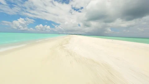 Flying over a sandy beach in the Maldives Video stock 239337291