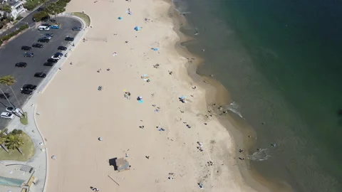 Flying Over Sandy Beach in Orange County Stock Footage 240069089