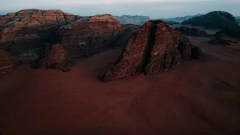 Flying over a sandy desert among rocks Stock Footage 297087614