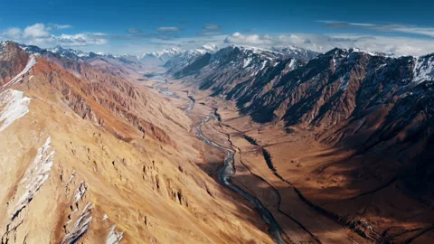Flying over a sandy desert among rocks Stock Footage 297099367