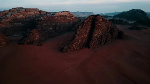 Flying over a sandy desert among rocks Stock Footage 297122402