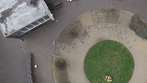 Flying up over the school Stock Footage