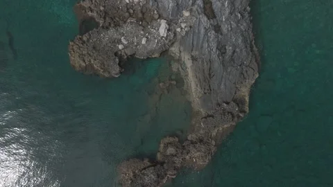 Flying up over sea rocks Stock Footage 288720453