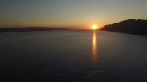 Flying over the sea at sunset. Croatia, Omis Dalmatia Stock-Footage 55253653