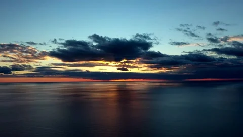 Flying over the sea at sunset Stock Footage 150813291