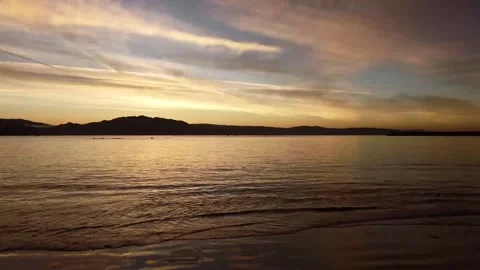 Flying over the sea to the sunset Stock Footage 205042413