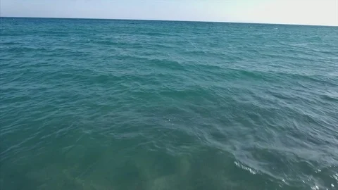 Flying over sea surface - 4K footage - italy drone Stock Footage 84789466