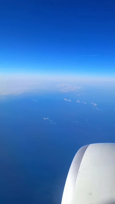 Flying over the sea, view from plane Stock Footage 310498827