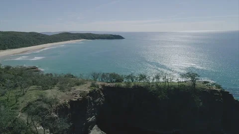 Flying over a secluded bay Stock Footage 291310545