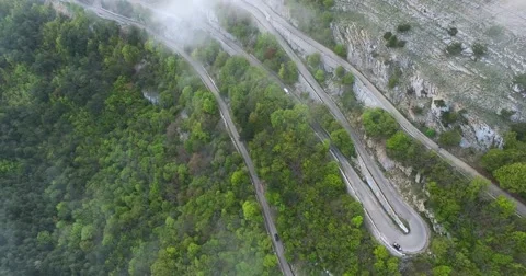 Flying Over Serpentine Road Stock Footage 63334322