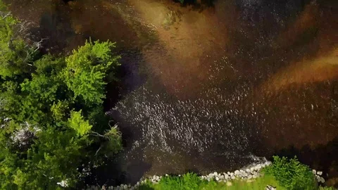 Flying over a shallow river sandbar Stock Footage 113704675