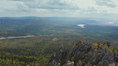 Flying over sharp cliffs with people at the top Stock Footage 146941182