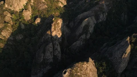 Flying over the sharp rocks with ancient little fortress in georgia Stock Footage 101363314