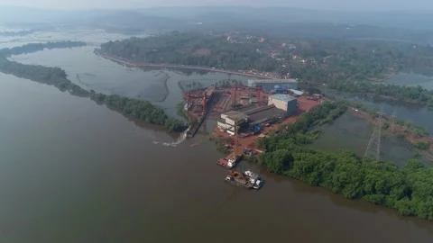 Flying over shipyard on a big river. Aerial view, high altitude. 스톡 동영상 85488437