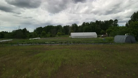 Flying over a small farm 動画素材 158757098