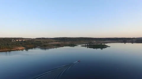 Flying over small powerboat 스톡 동영상 56301572