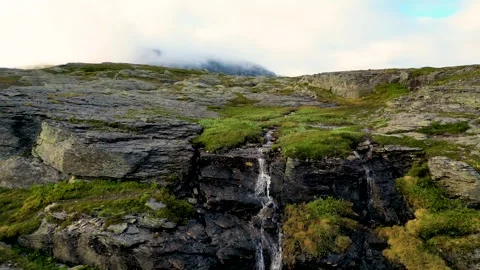 Flying Over A Small River On Top Of A Mountain 4K Areal Stock Footage 249906818
