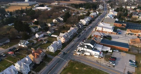 Flying Over Small Town of Hampstead Main Street in Rural Maryland Stock Footage 100704457