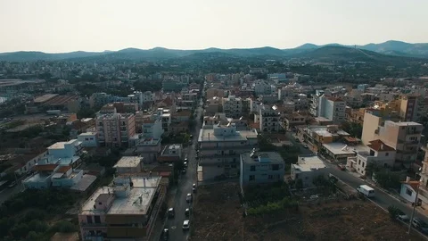 Flying over small town in southern Europe at sunset. Aerial cityscape. Stock Footage 86962960