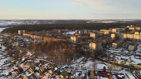 Flying over a small urban area in winter Stock Footage 254079939