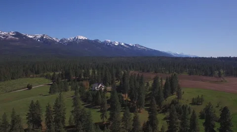 Flying Over Snow Capped Mountains with a Home Video stock 65637862