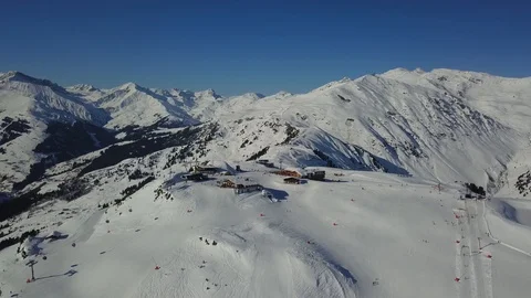 Flying over snow-capped mountains Stock Footage 103516163