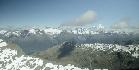 Flying over snow covered mountains Video stock 64451460