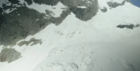 Flying over snow covered mountains in New Zealand. 6K  Stock Footage 64453138