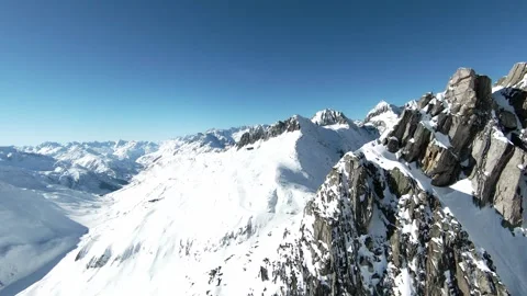Flying Over Snow Covered Mountains. Winter Landscape Aerial View Vídeos de archivo 267756807