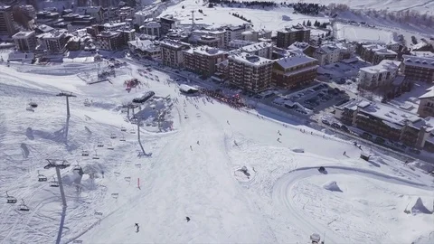 Flying over a snow-covered ski slope with a drone Stock-Footage 83691444