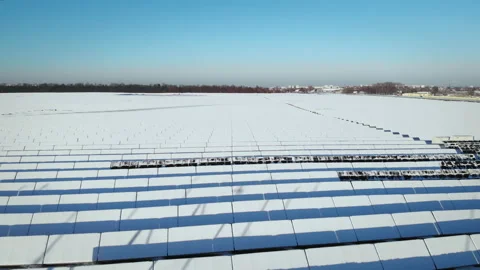 Flying over snow-covered solar panels 動画素材 218450587