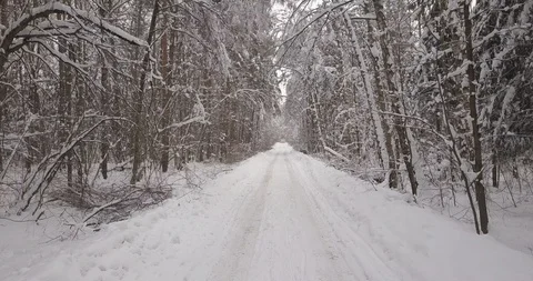 Flying over Snow Road in Russian Forest Stock Footage 86255199