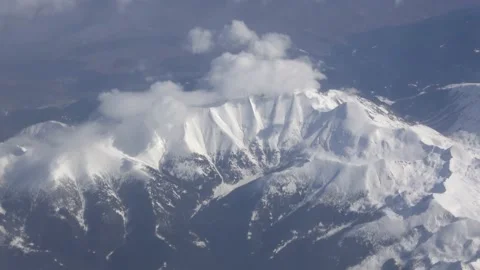 Flying over snowy highlands Video stock 141563202