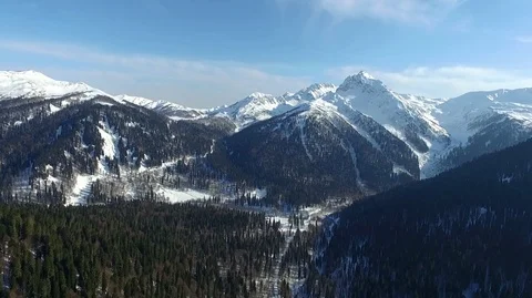 Flying over snowy mountains Stockbeeldmateriaal 88083568