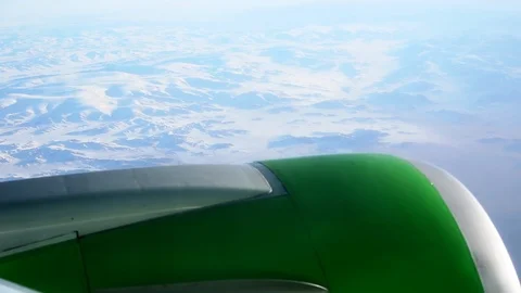 Flying over the snowy mountains Stock Footage 111189077