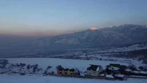 Flying over snowy mountains Stock Footage 231104294